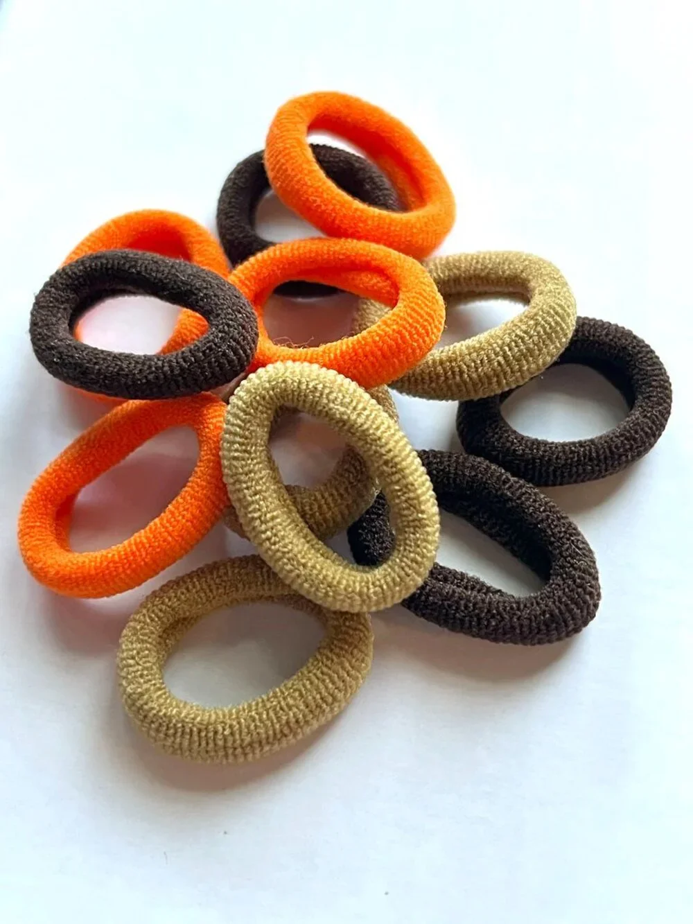 Brown and orange hair elastics NWOT *free in bundle*